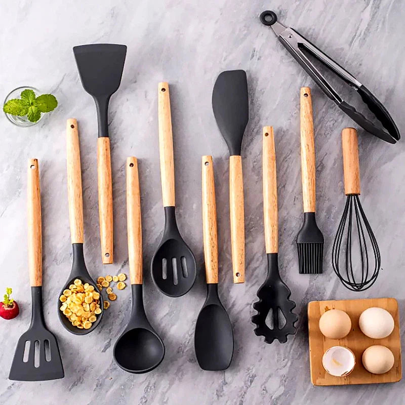 12-piece silicone kitchen utensil set with wooden handles and storage bucket, high temperature resistant and non-stick.