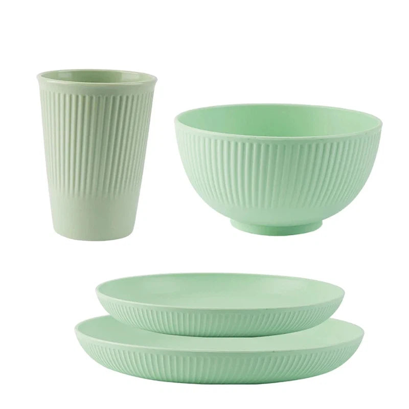 4-piece eco-friendly wheat straw dinnerware set, including plate, bowl, and cup, ideal for unbreakable kitchen use and camping.