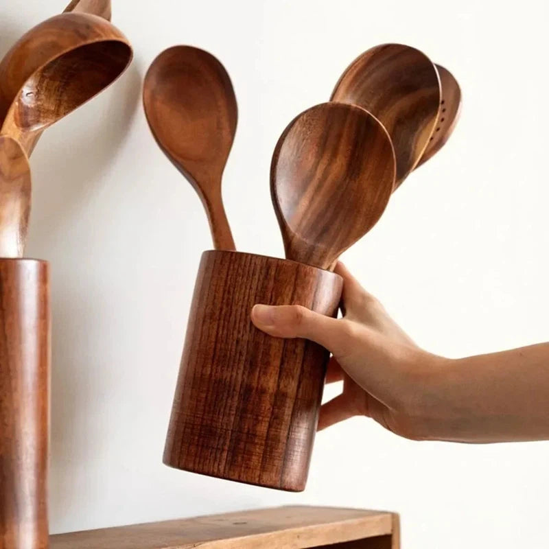 Wooden kitchen utensils set with soup spoon, spatula, and rice spoon; eco-friendly and durable cookware.