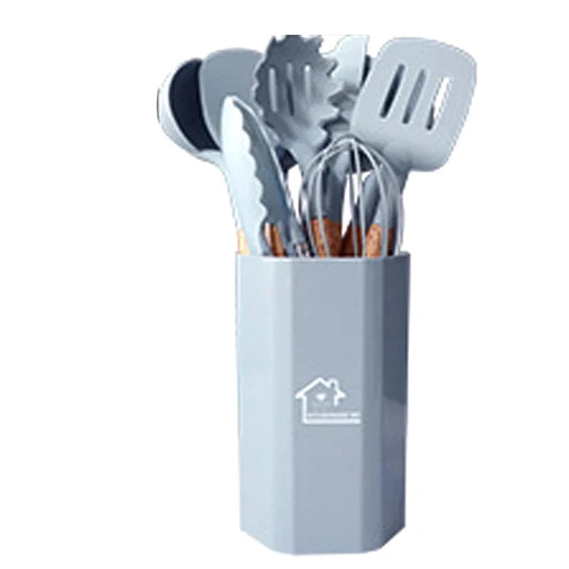 11Pcs silicone cooking utensils set with wooden handles in a container.