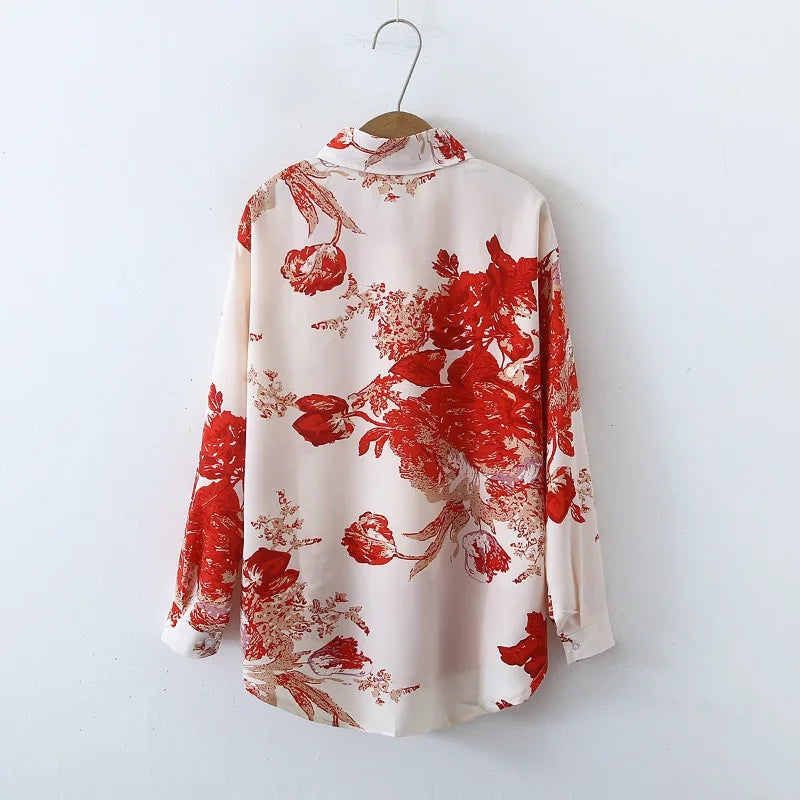 Floral print blouse with long sleeves and turn-down collar in casual streetwear style.