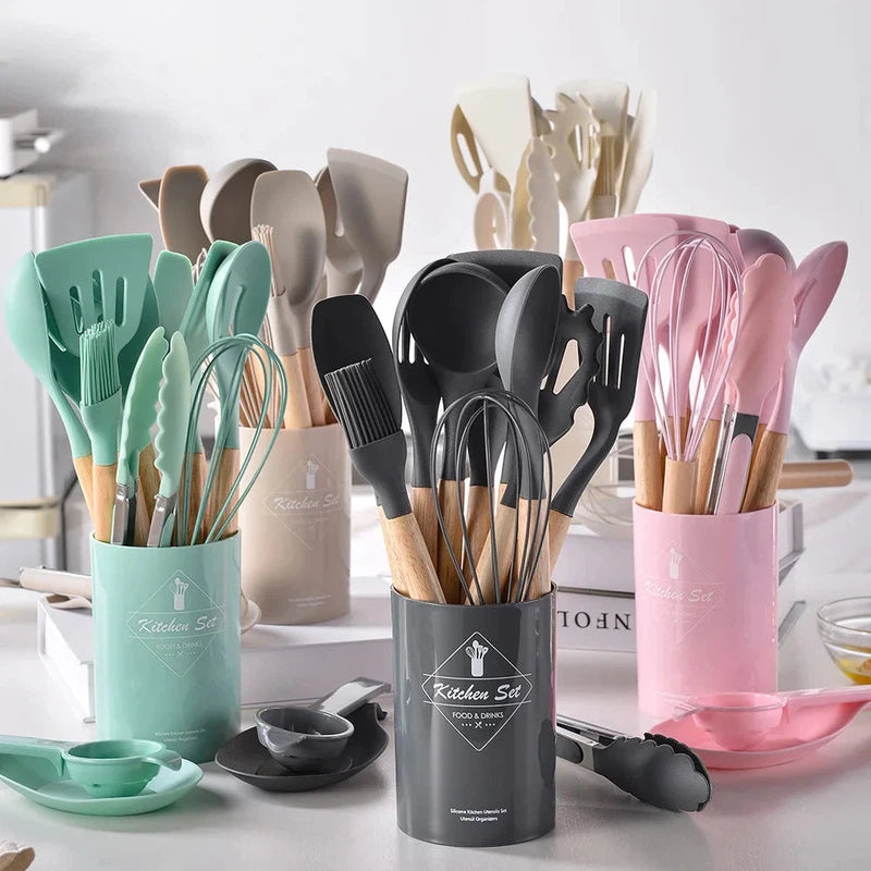 12-piece non-stick silicone kitchen utensils set with spatula, shovel, egg beaters, and wooden handles.