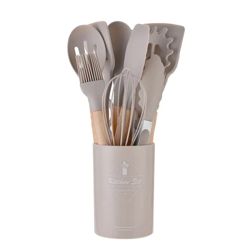 12-piece non-stick silicone kitchen utensil set with wooden handles, including spatula, shovel, and egg beaters.