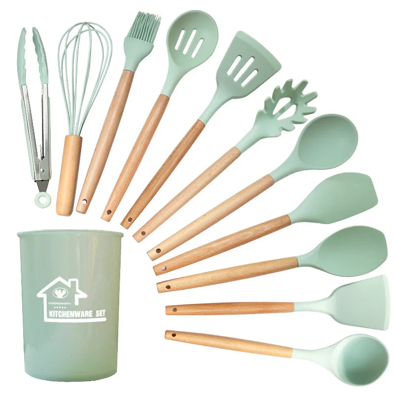 12-piece silicone non-stick kitchen utensil set with wooden handles, featuring spatulas and egg beaters. Eco-friendly cooking tools.