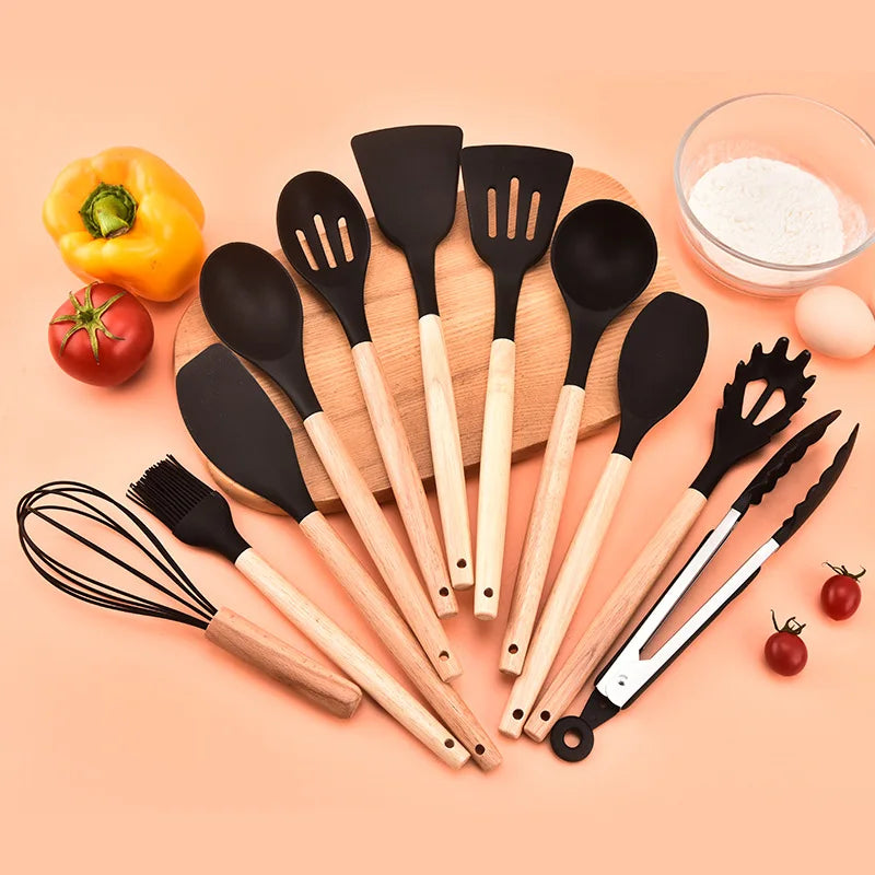 12PCS silicone non-stick cookware set with wooden handles, including spatulas and egg beaters, ideal kitchenware accessories.