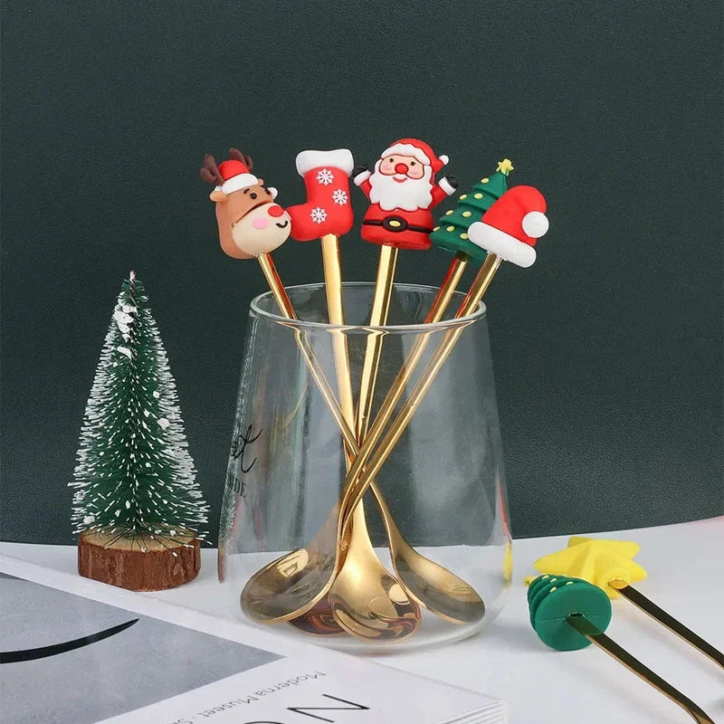 Christmas-themed stainless steel coffee spoons and forks set in red and green gift box with festive designs.