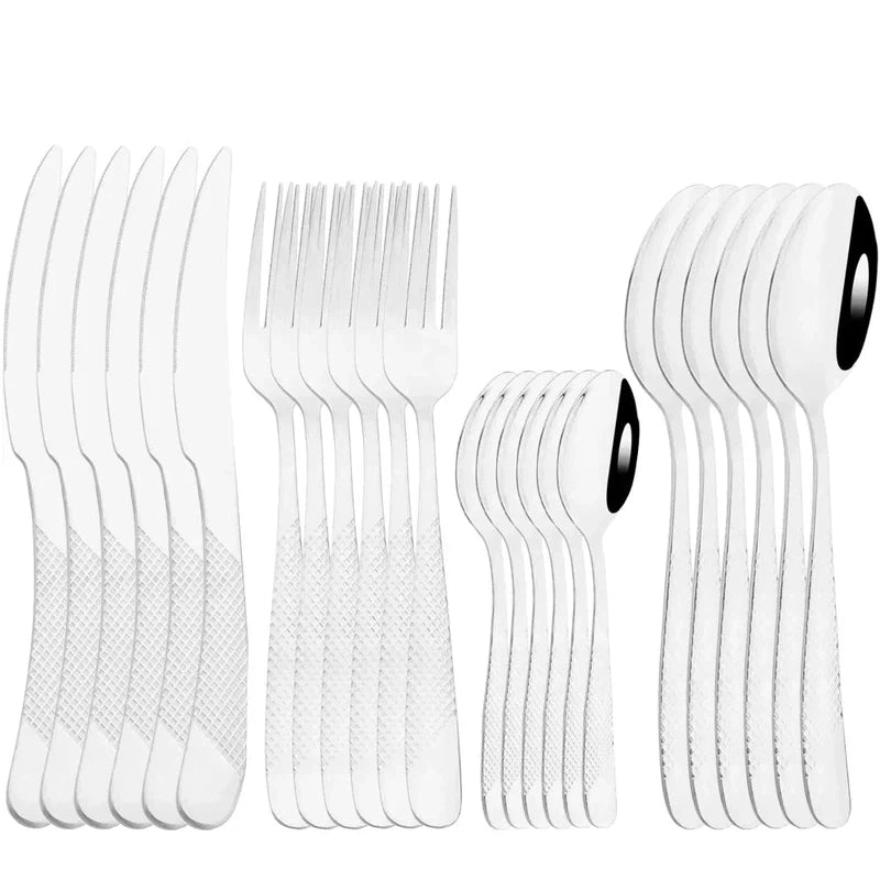 24-piece stainless steel tableware set with knives, forks, and spoons, mirror finish, dishwasher safe.